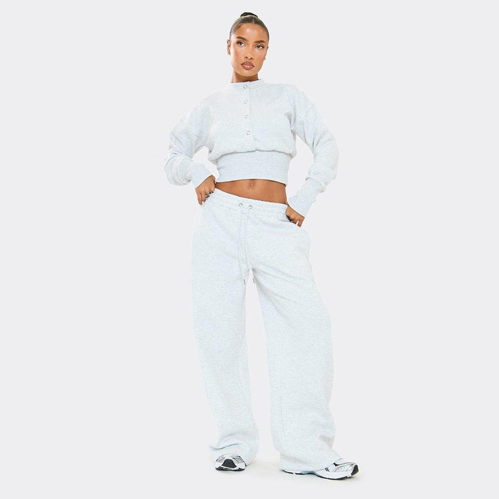 Kvinne Komfortabel Kuttet Sweatshirt og Løse Treningbukser Sett Skjora