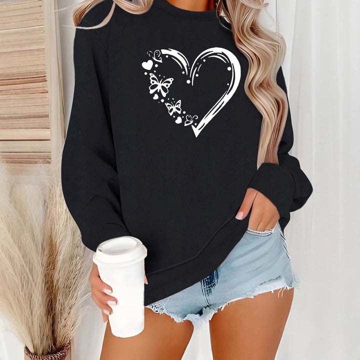 Dame sweatshirt med kreativt hjerte- og sommerfugl-design Skjora