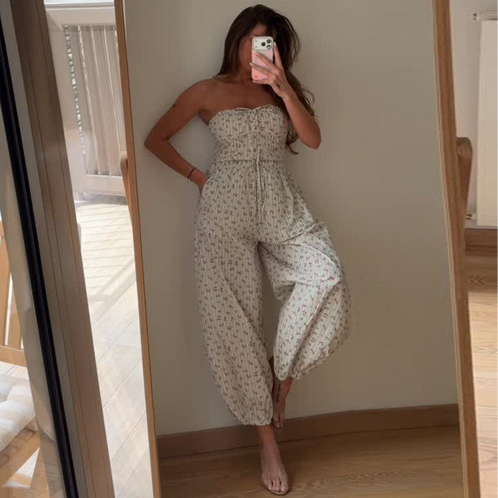 Dame jumpsuit med lekent blomstermønster og elastisk midje snor Skjora