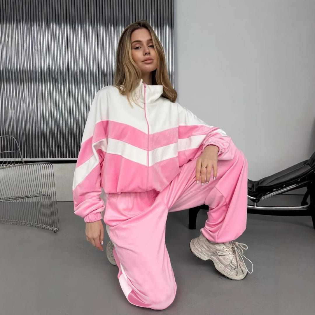 Dame sporty velur treningsdrakt med elegant glidelås og moderne striper Skjora