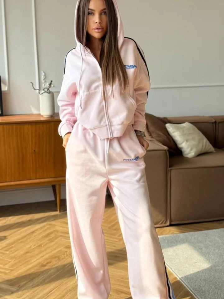 Kvinnenes sporty fritidssett med casual zip hettegenser og komfortable joggebukser Skjora