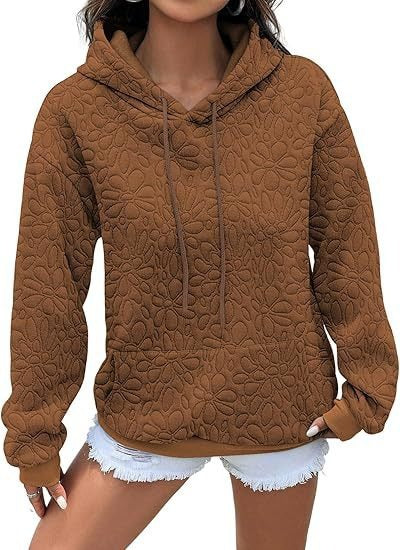 Mote sweatshirt for kvinner med teksturert blomsterdesign Skjora