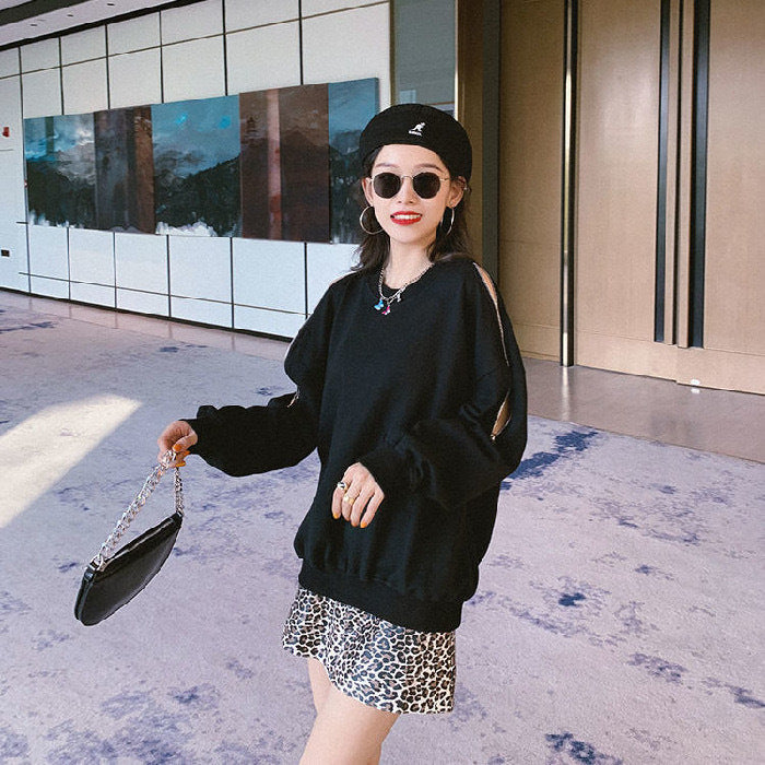 Kvinnes uformell oversized genser med åpne skuldre og moderne design
