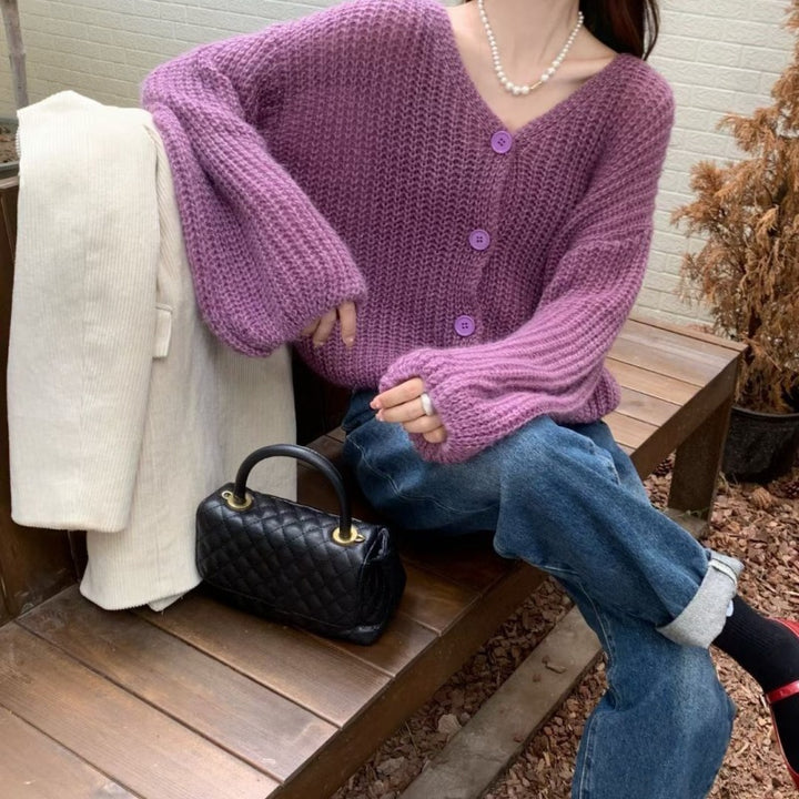 Dame cardigan med overdimensjonerte ermer og knappdetalj Skjora