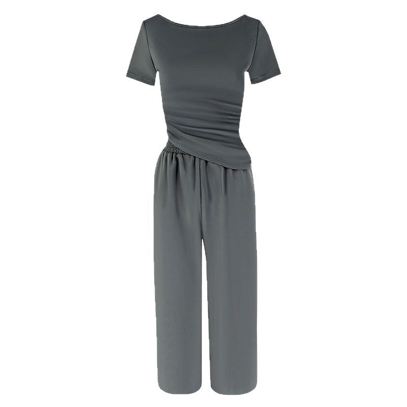 Dame jumpsuit med asymmetrisk snitt og vidbenet design Skjora