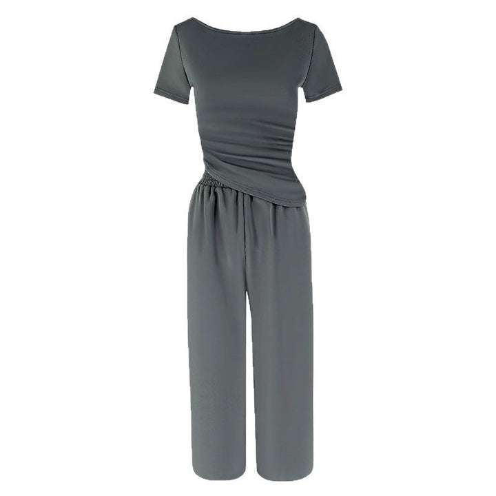 Dame jumpsuit med asymmetrisk snitt og vidbenet design Skjora