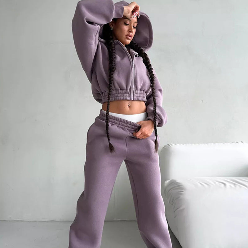 Kvinners sporty fleece jumpsuit med hette og løs passform Skjora