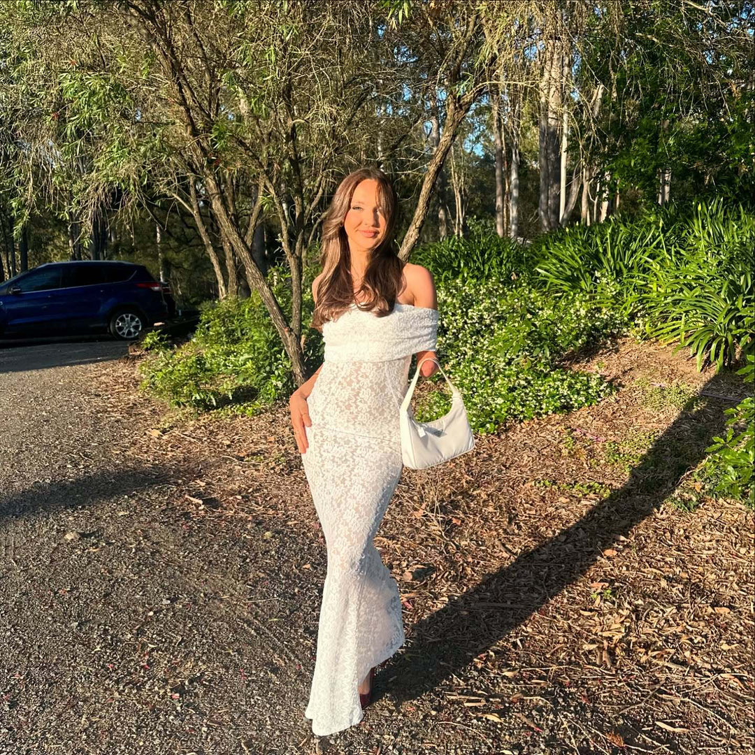 Dame Forførende blonde maxikjole med off-shoulder design Skjora