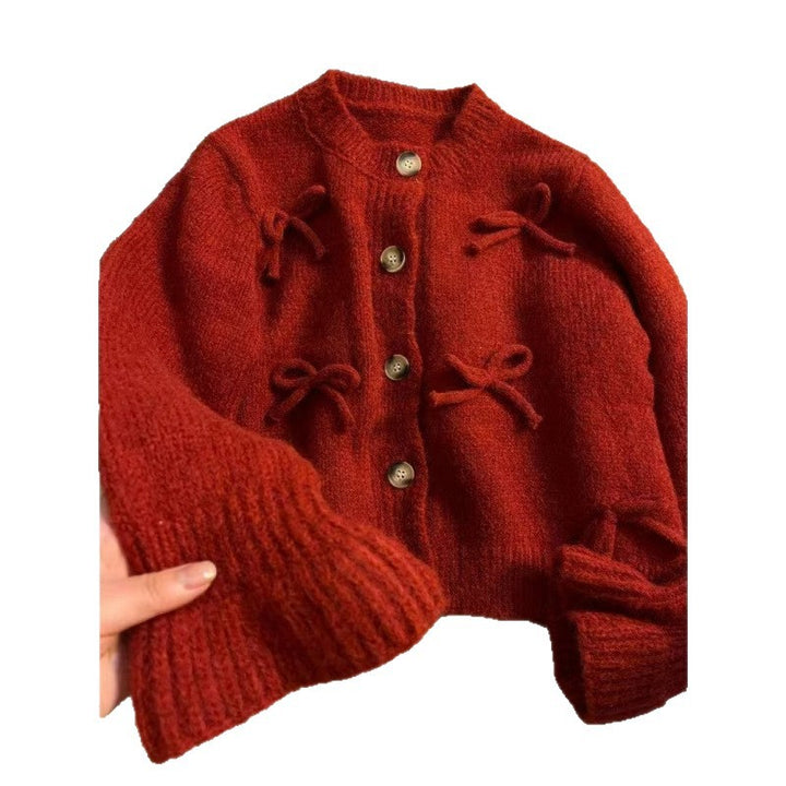 Dame cardigan med dekorative sløyfer på