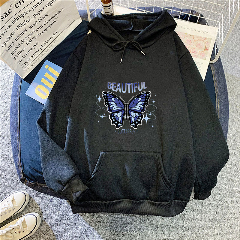 Dame hettegensere med kreativ sommerfugldesign Skjora
