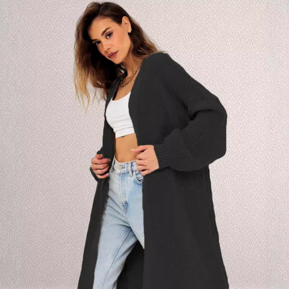 Kvinnens chunky strikk cardigan med åpen frontdesign og dype lommer Skjora