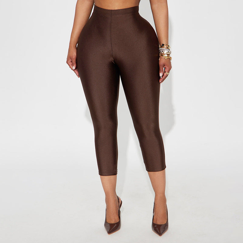 Dame figurnær capri-leggings med høy midje og luksuriøs glans Skjora