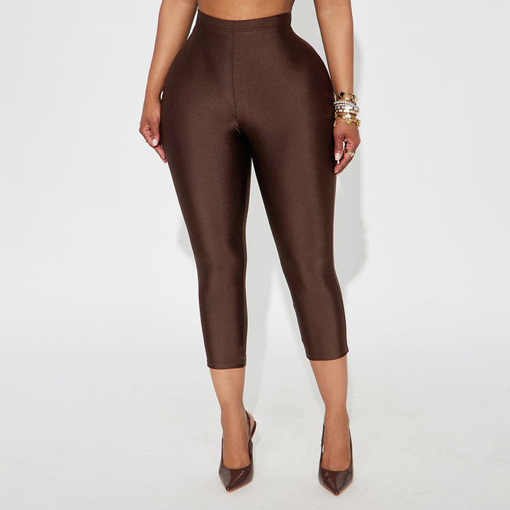 Dame figurnær capri-leggings med høy midje og luksuriøs glans Skjora
