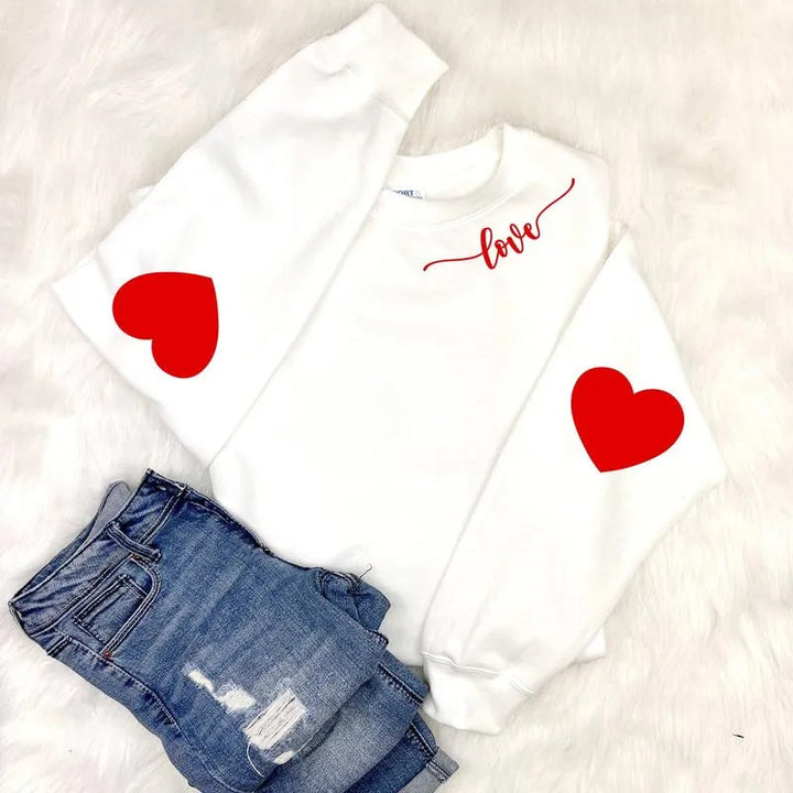 Dame sweatshirt med hjerte design og avslappet passform Skjora