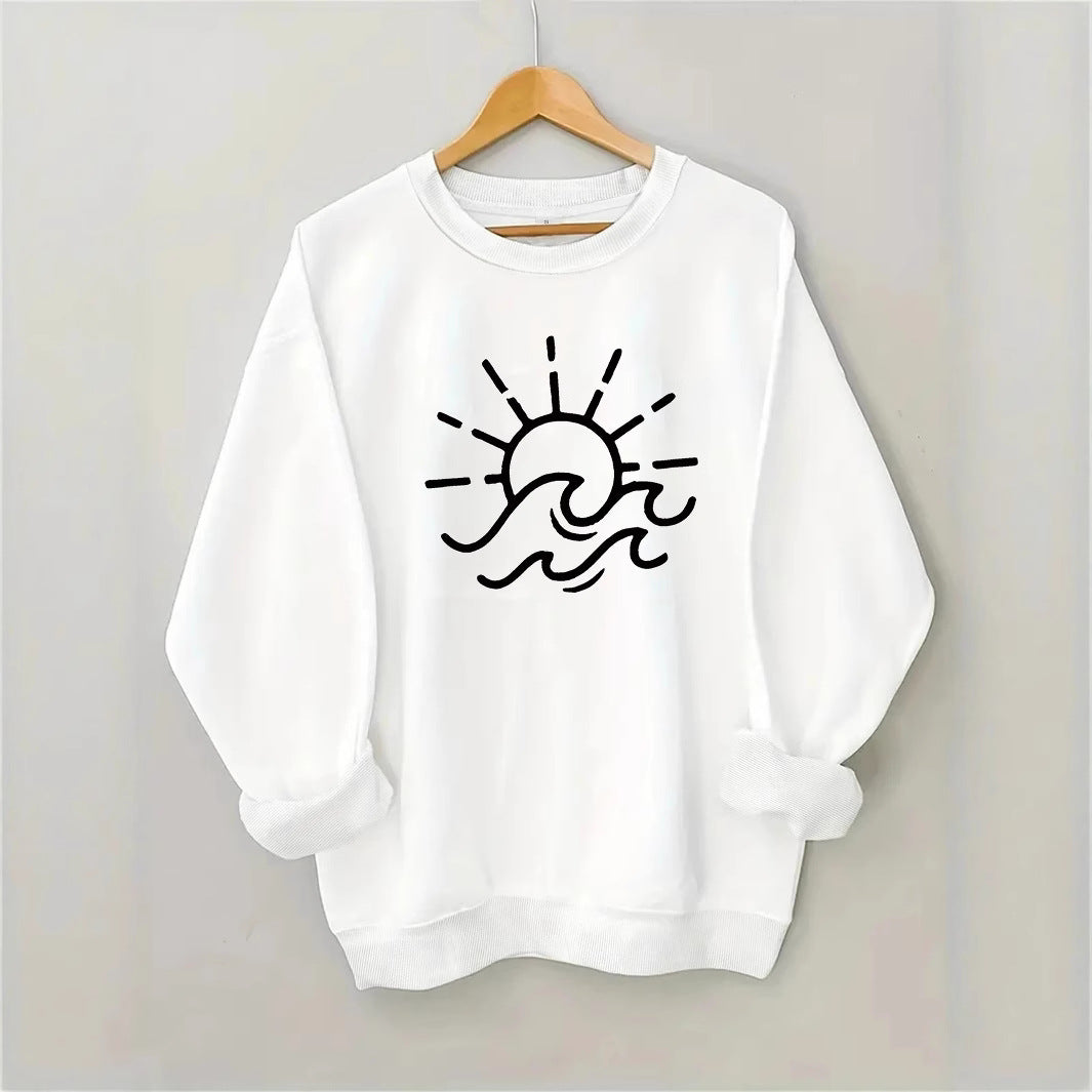 Dame sweatshirt med kreativ sol- og bølgedesign Skjora