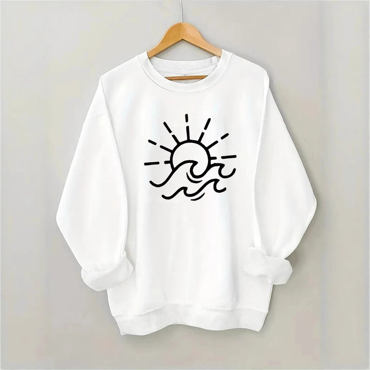 Dame sweatshirt med kreativ sol- og bølgedesign Skjora