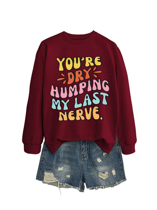 Dame sweatshirt med munter tegneserie slagord og uformell snitt Skjora