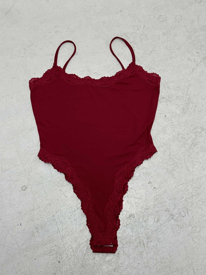 Damer elegant bodysuit med spisse detaljer og justerbare stropper Skjora