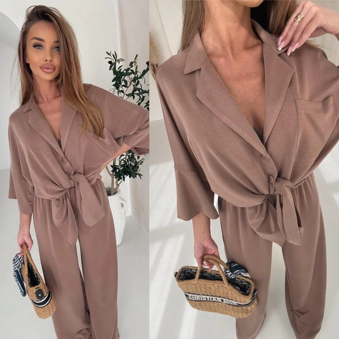 Kvinnens casual jumpsuit med belte og vide ben