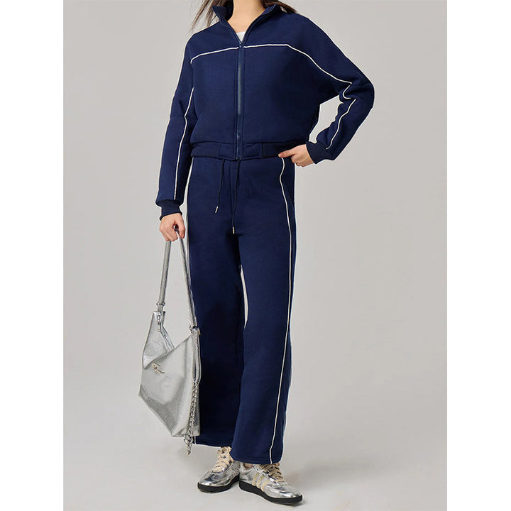 Kvinnelig sporty fritidssuit med høy krage og elastisk linning Skjora