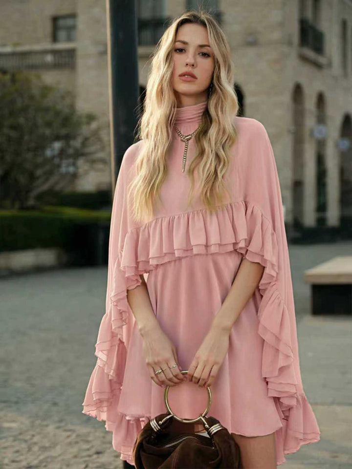 Dame Elegant rynkedress med høy hals og flytende snitt Skjora