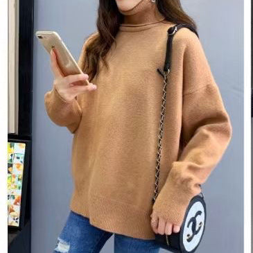Kvinnens chunky strikkegenser med høy hals og oversized passform Skjora