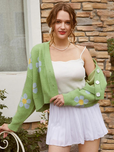 Kvinnes chunky strikk cardigan med blomstermønster og knappedetaljer Skjora
