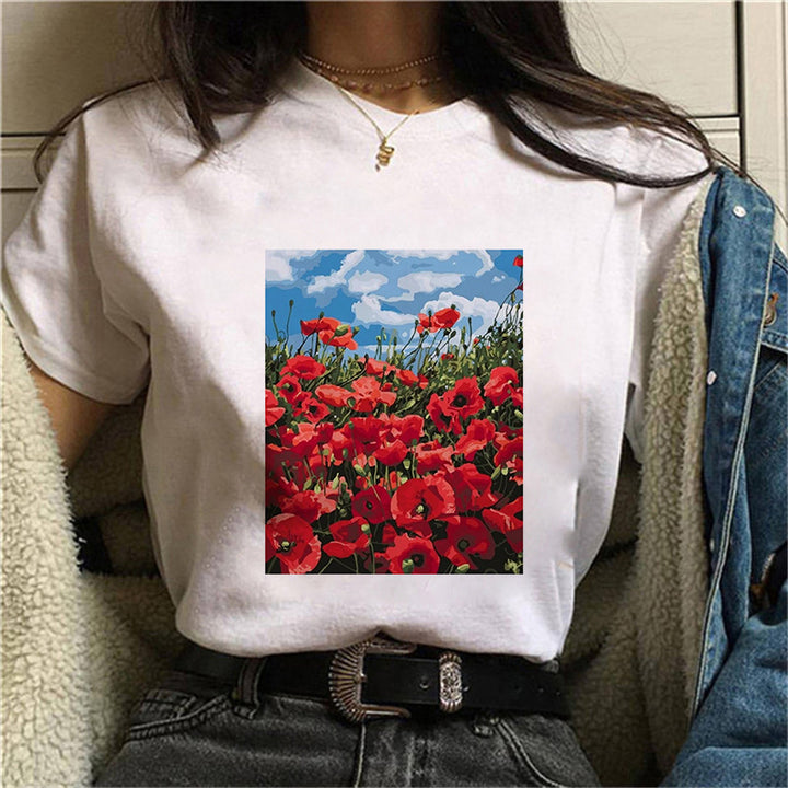 Dame T-skjorte med blomstertrykk og V-hals Skjora