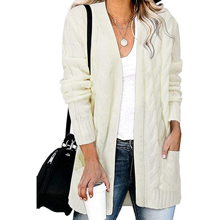 Dame cardigan i elegant flettemønster med åpne lommer Skjora