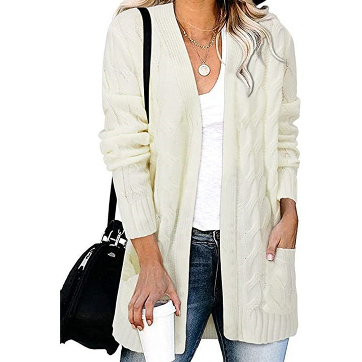 Dame cardigan i elegant flettemønster med åpne lommer Skjora