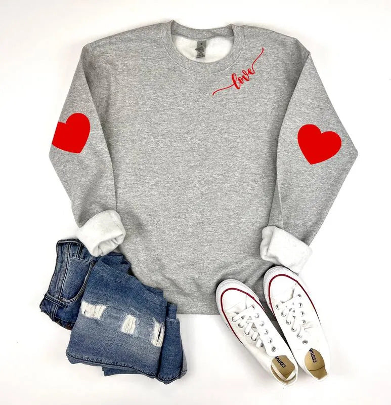 Dame sweatshirt med hjerte design og avslappet passform Skjora
