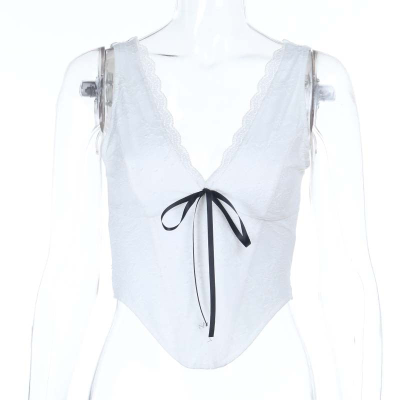 Damespits-Bustier med elegant V-hals og dekorativt sløyfedetalj Skjora