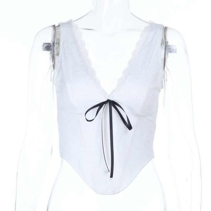 Damespits-Bustier med elegant V-hals og dekorativt sløyfedetalj Skjora