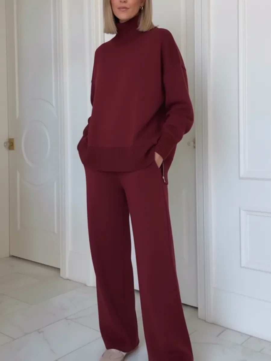 Kvinnelig komfortabel strikket loungewear-sett med høye halsgenser og vide bukser Skjora
