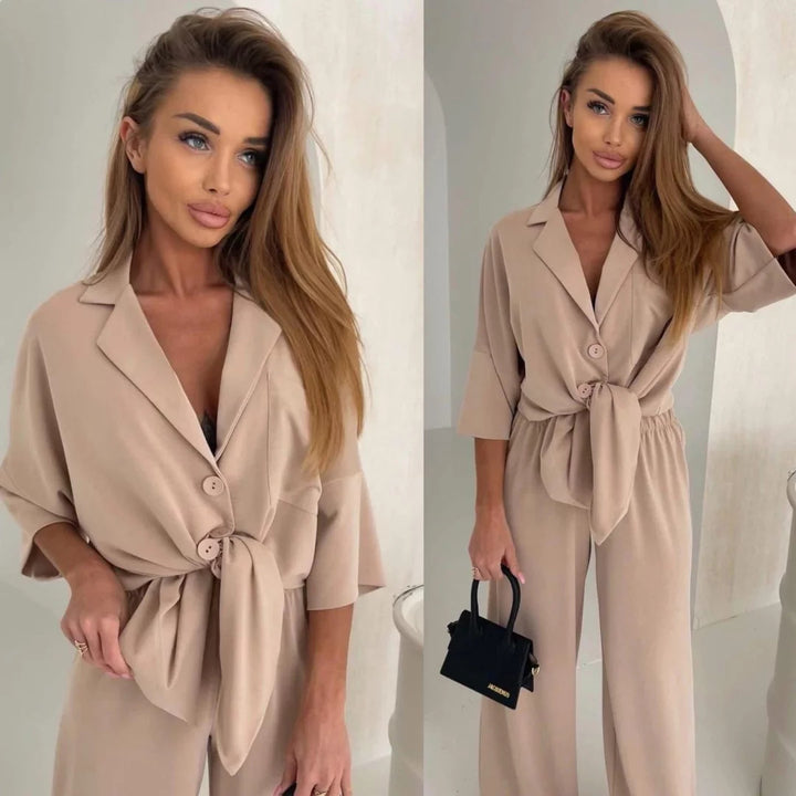 Kvinnens casual jumpsuit med belte og vide ben