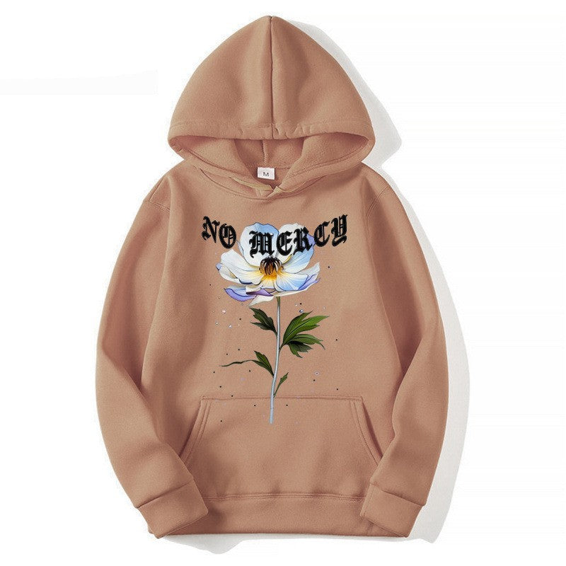 Damegenser med blomsterprint og fremtredende tekst Skjora