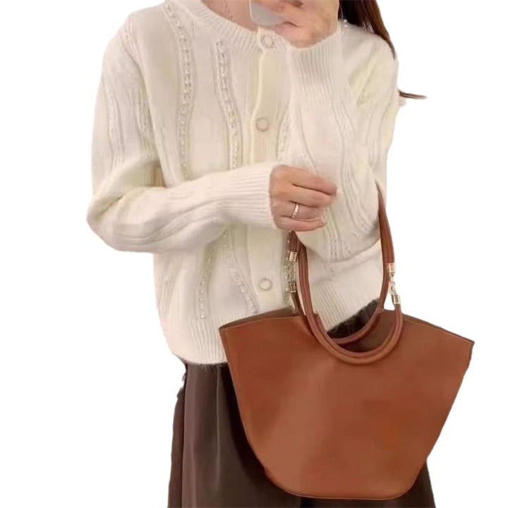 Dame cardigan med elegante perledetaljer og klassisk snitt Skjora