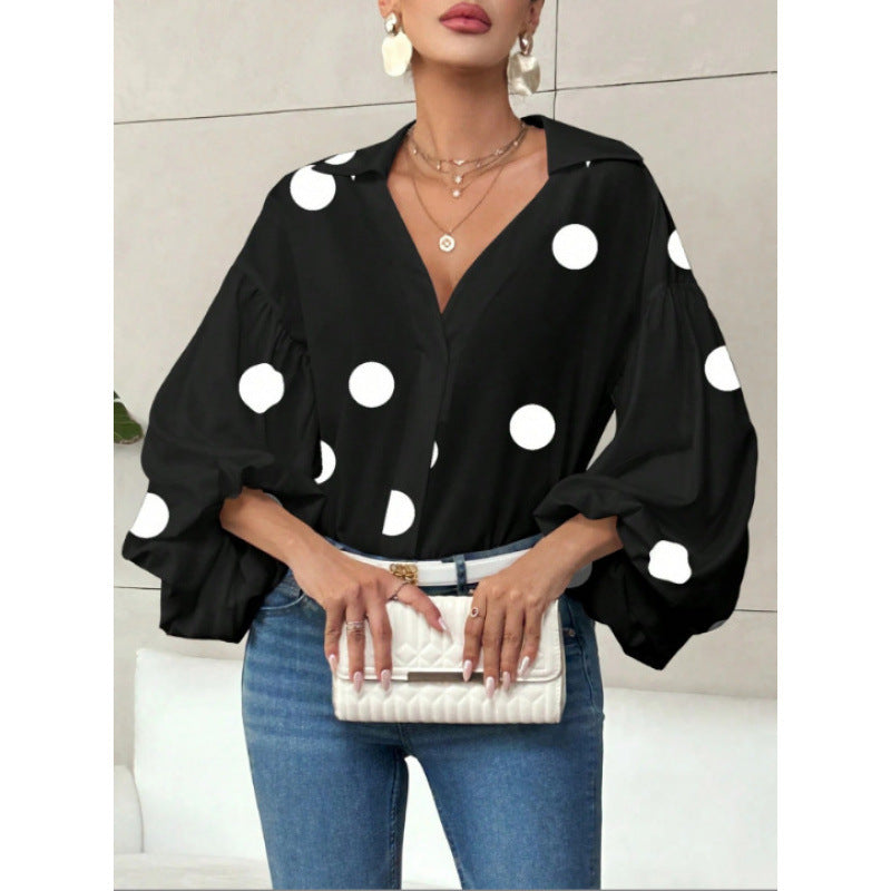Damebluse med voluminøse ballongermer og elegant krage Skjora