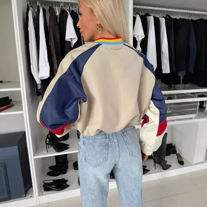 Kvinnens sporty bomberjakke med fargeblokkdesign og elastiske mansjetter Skjora