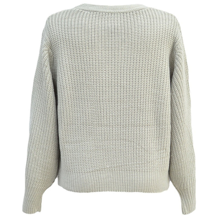 Kvinnens trendy chunky strikkegenser med knappeløsninger og løs passform Skjora