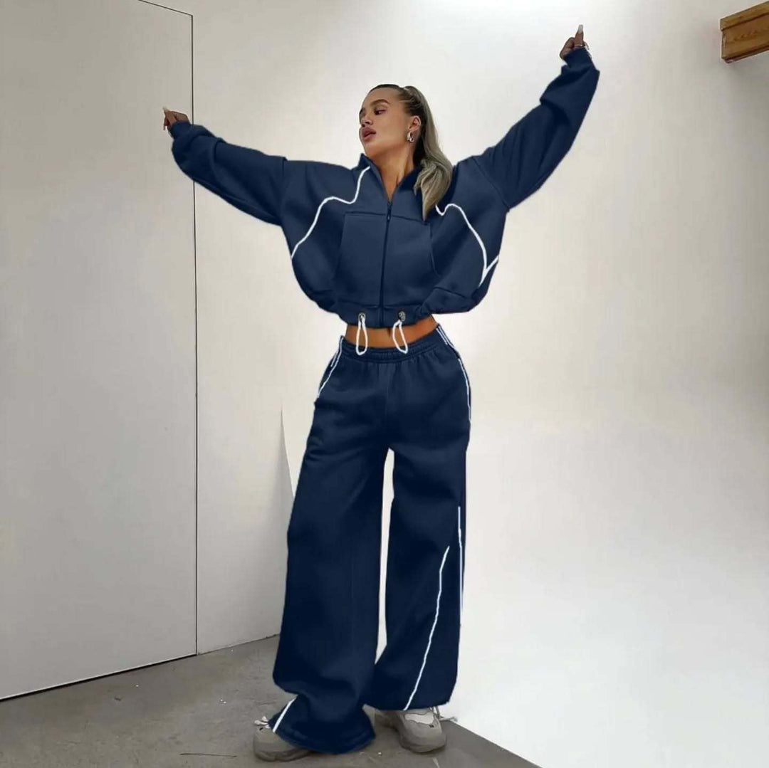 Kvinnors sportiga oversized-set i mjuk fleece med kontraststripes Skjora