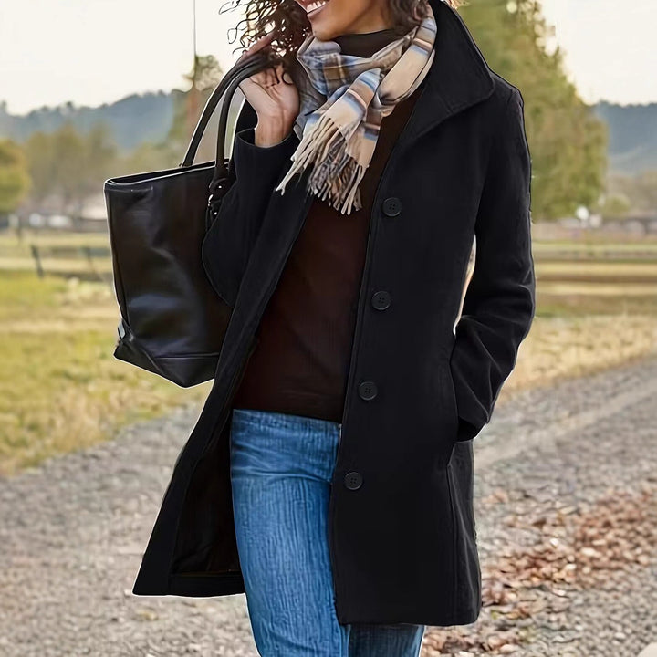 Kvinnes elegant ullfrakk med moderne krage og praktiske lommer Skjora