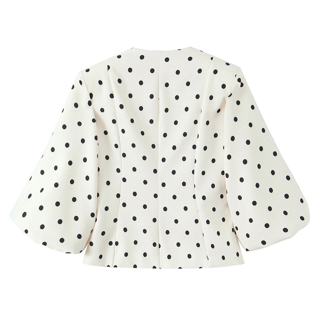 Damebluse med voluminøse ermer og polka-prikk mønster Skjora