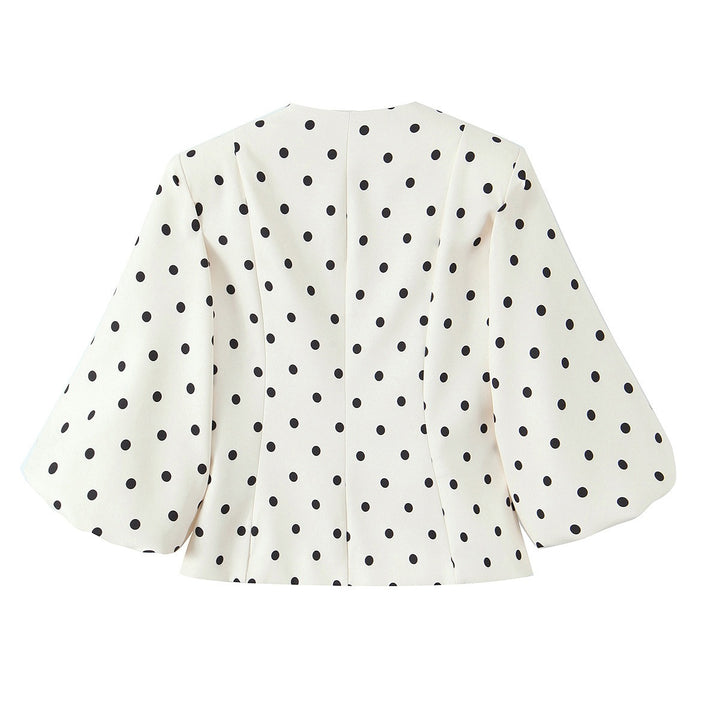 Damebluse med voluminøse ermer og polka-prikk mønster Skjora