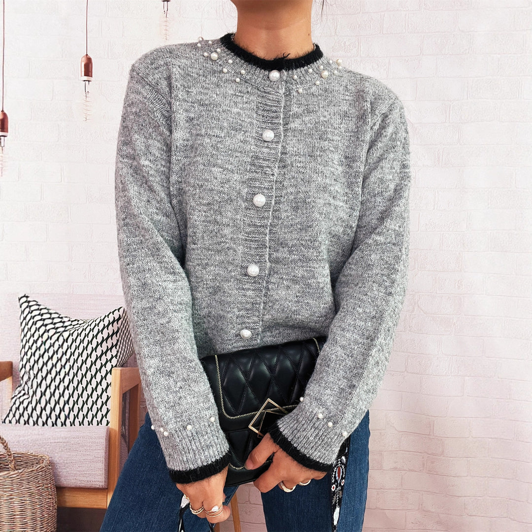 Dame elegant cardigan med dekorative knappe detaljer og perle utsmykkinger Skjora