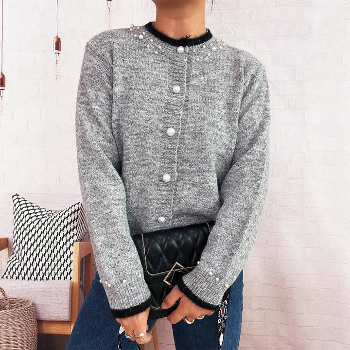 Dame elegant cardigan med dekorative knappe detaljer og perle utsmykkinger Skjora