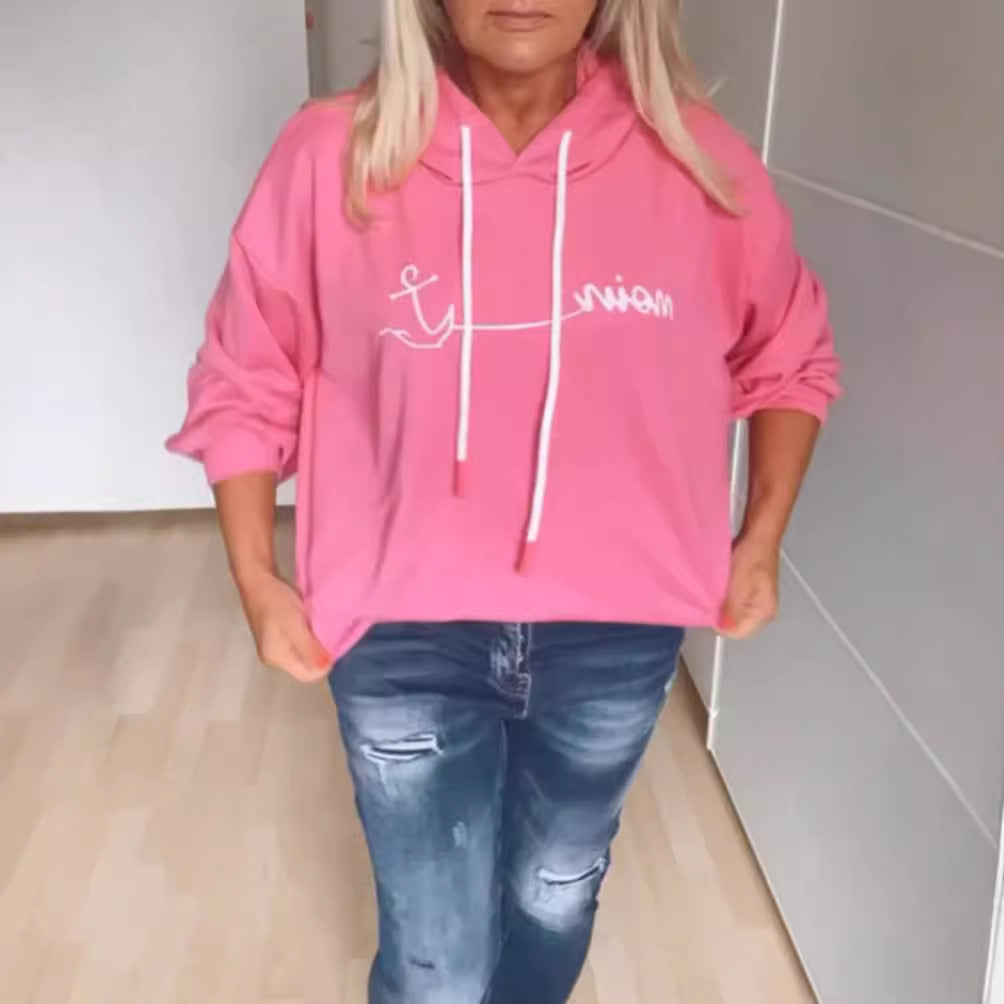 Dames avslappet hettegenser med moderne trykk og praktiske lommer Skjora
