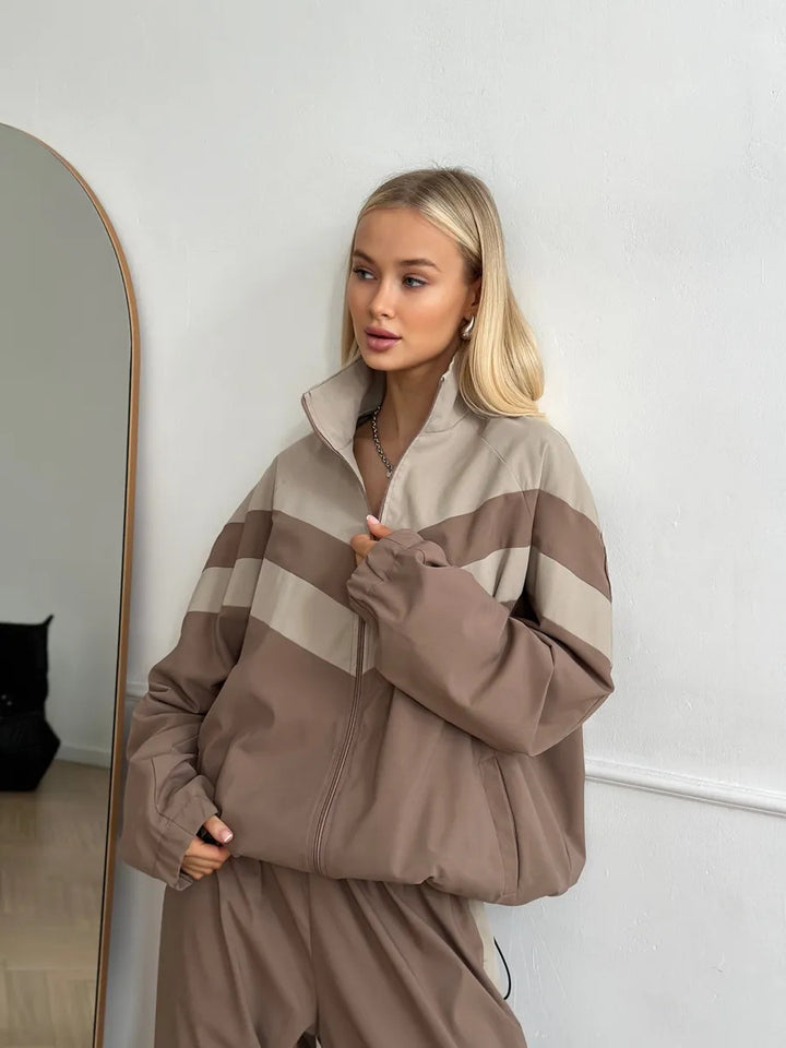Dame sporty jakke med høy krage og moderne design Skjora