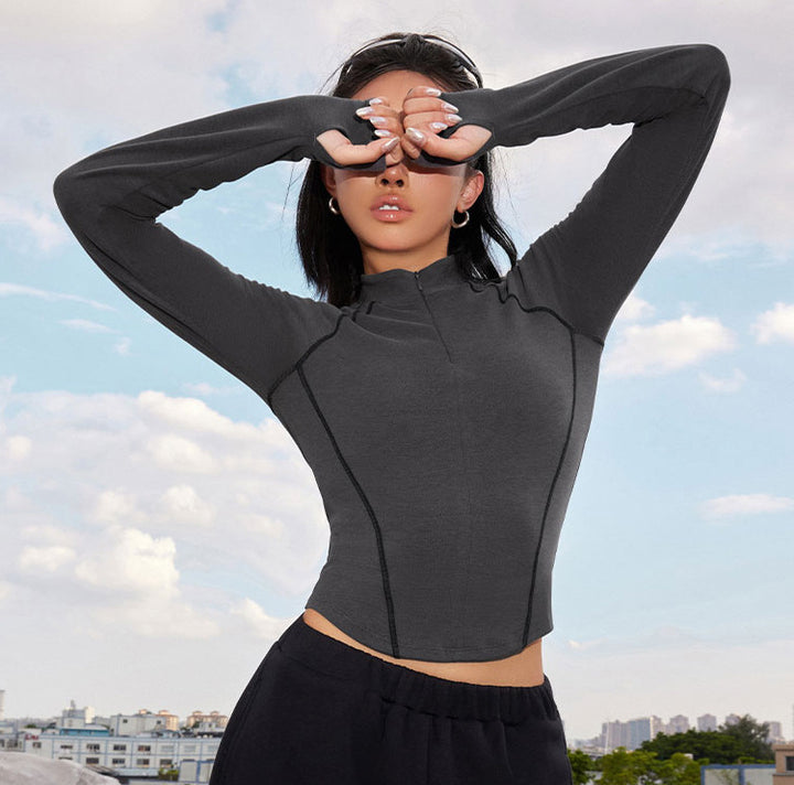 Women's Breathable Sports Top with High Collar and Thumbholes Skjora