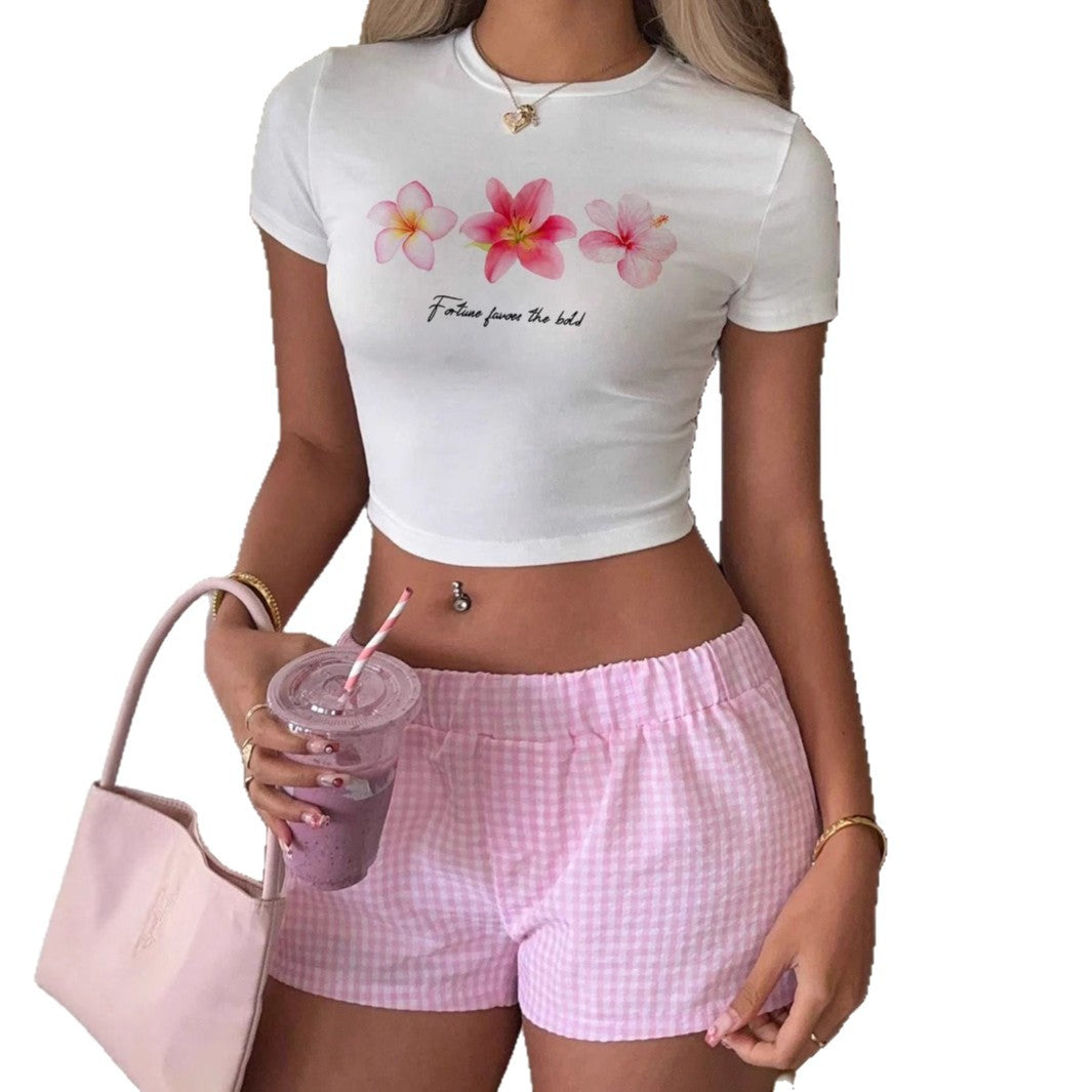 Dame Crop-Top med blomsterdesign og motiverende tekst Skjora